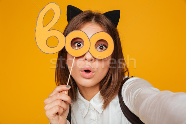 Close up portrait of a pretty teenage schoolgirl Stock photo © deandrobot