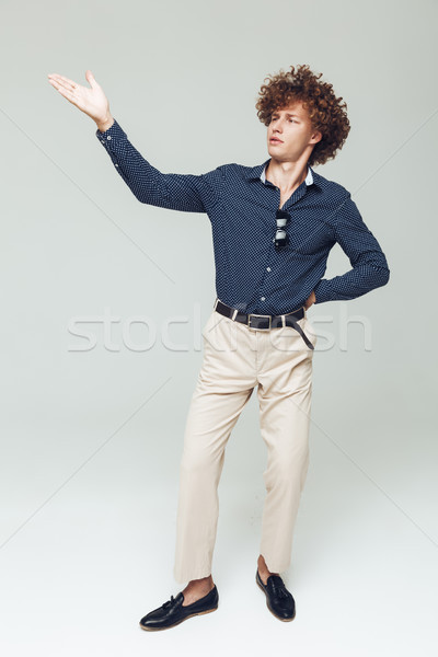 Handsome young retro man dressed in shirt Stock photo © deandrobot