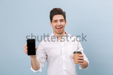 [[stock_photo]]: Souriant · jeune · homme · téléphone · image · blanche