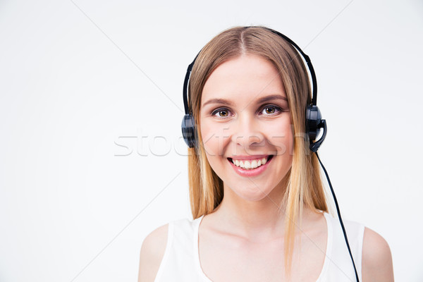 Cheerful female assistant operator in headset Stock photo © deandrobot