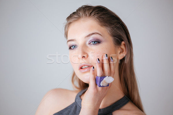 Young woman with fresh skin Stock photo © deandrobot