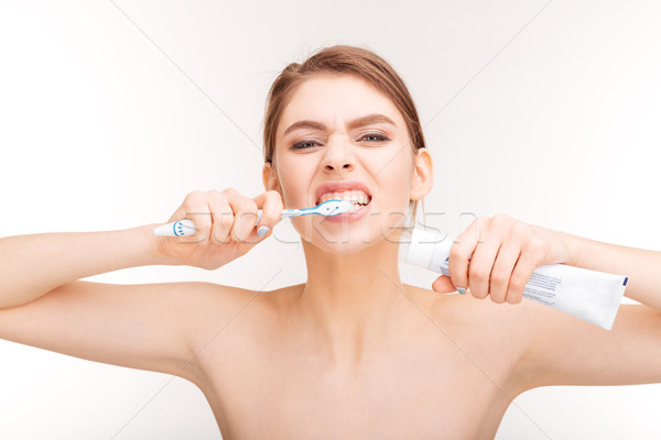 Porträt schöne Frau halten Zahnpasta schönen Stock foto © deandrobot