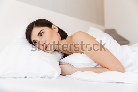 Close-up portrait of aa beautiful young woman in bed Stock photo © deandrobot