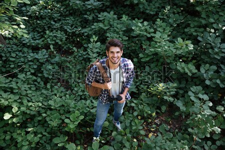From above image of man with water in forest Stock photo © deandrobot
