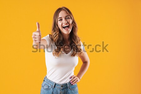 Femme de remise en forme jaune geste photos [[stock_photo]] © deandrobot