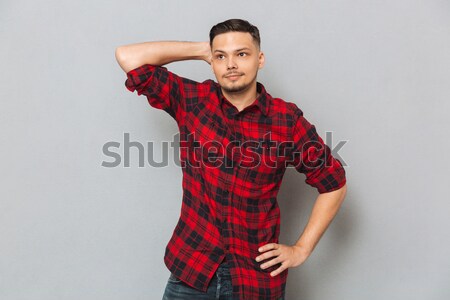 Vertical image of Happy hipster in red shirt Stock photo © deandrobot