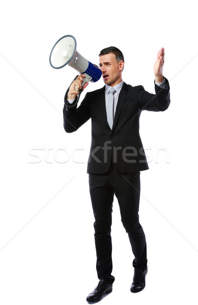 Full length portrait of businessman yelling through megaphone isolated on white background Stock photo © deandrobot