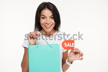 Nő mutat táblagép képernyő mosolyog csinos nő Stock fotó © deandrobot