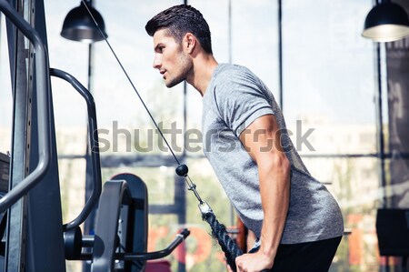 Om antrenament sală de gimnastică portret fitness corp Imagine de stoc © deandrobot