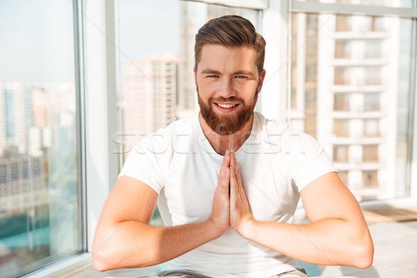 Bärtigen Mann Meditation Fenster home Haus Stock foto © deandrobot