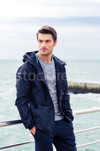 Fitness homme permanent extérieur portrait jeunes [[stock_photo]] © deandrobot