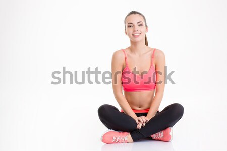 Séduisant jeunes séance jambes croisées [[stock_photo]] © deandrobot