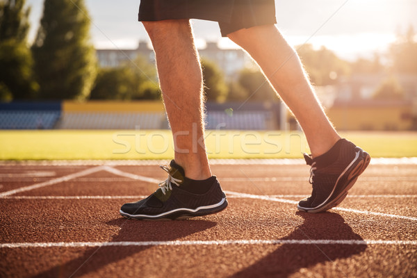 Sprinter getting ready to start an exercise Stock photo © deandrobot
