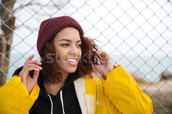 Stock photo: Happy african young lady walking outdoors