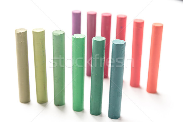 Close up of bunch standing colorful pastel chalks with color gra Stock photo © deandrobot