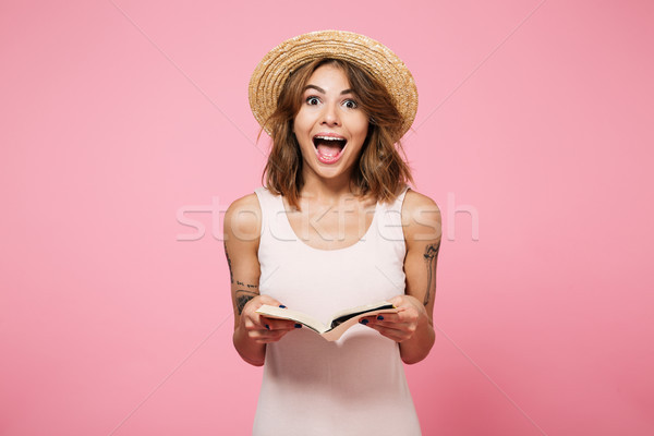 Portré boldog lány nyár kalap tart könyv Stock fotó © deandrobot