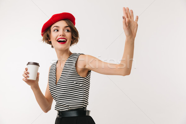 Portrait of a smiling woman wearing red beret Stock photo © deandrobot