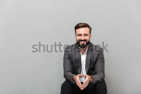 Cropped portrait of relaxed man resting while sitting on chair i Stock photo © deandrobot