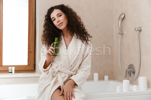 Femme salle de bain douche gel shampooing Photo stock © deandrobot