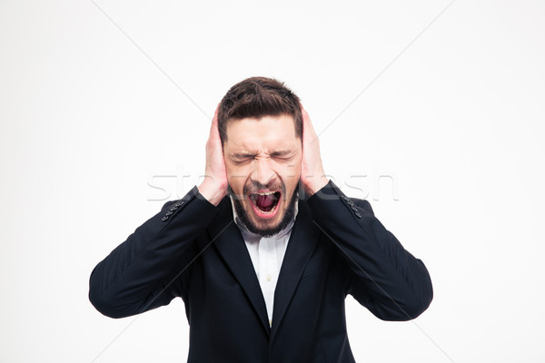 Businessman covering his ears and screaming  Stock photo © deandrobot