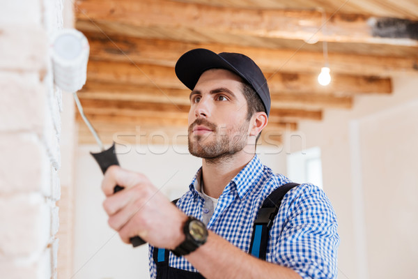 Foto stock: Primer · plano · retrato · constructor · trabajador · pintura · pared