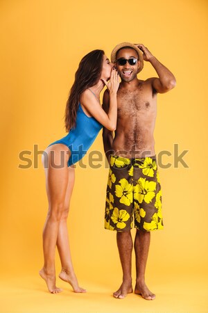 Couple holding glass bottles and cooler bag for picnic Stock photo © deandrobot