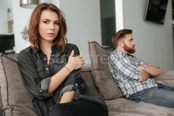 傷心 吵架 愛 情侶 坐在 沙發 商業照片 © deandrobot