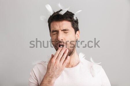 Shocked business man covering mouth Stock photo © deandrobot