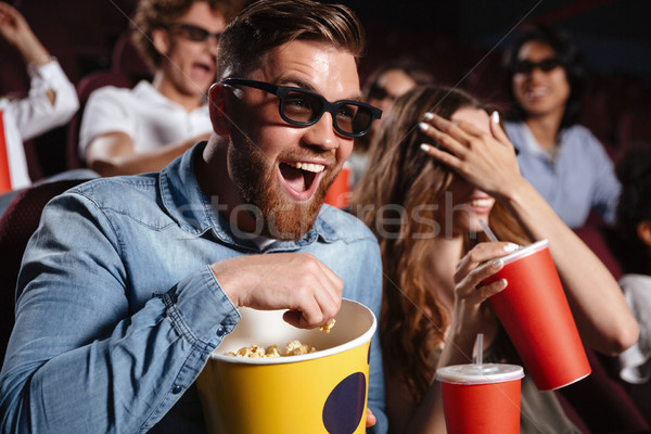 Nevet barátok ül mozi óra film Stock fotó © deandrobot