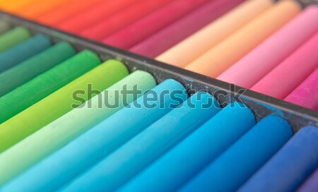 Close-up image of colorful chalk pastels in box Stock photo © deandrobot