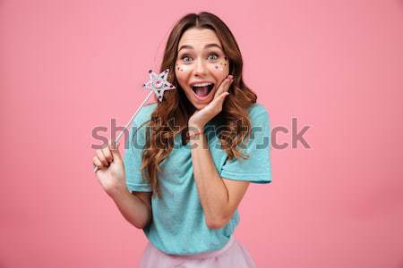 Portrait of a funny young woman dressed in swimsuit Stock photo © deandrobot