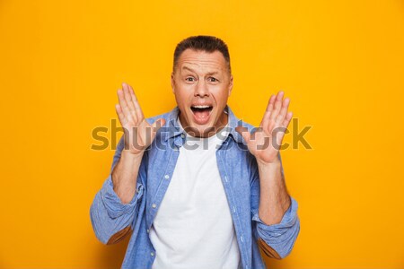 肖像 中年男子 指向 手指 上 商業照片 © deandrobot