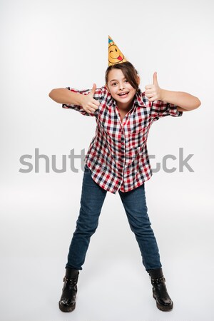 Stock photo: Happy young birthday girl posing