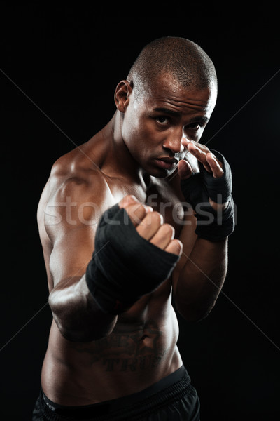 Stock photo: Portrait of afroamerican boxer posing in boxing bandage