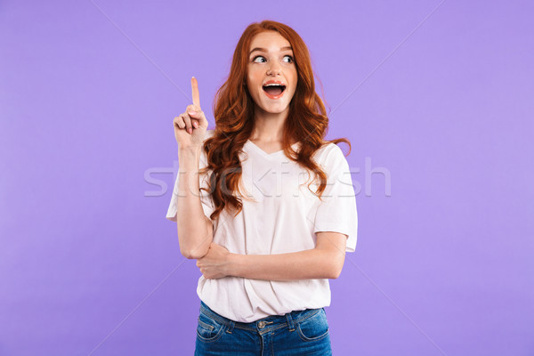 Portrait of a happy young girl standing Stock photo © deandrobot