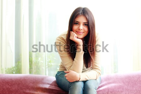 Jungen schönen glücklich Frau Sitzung Sofa Stock foto © deandrobot