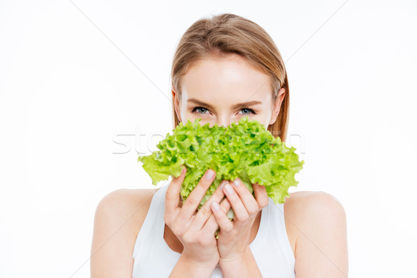 Cute Frau halten grünen Salat isoliert Stock foto © deandrobot