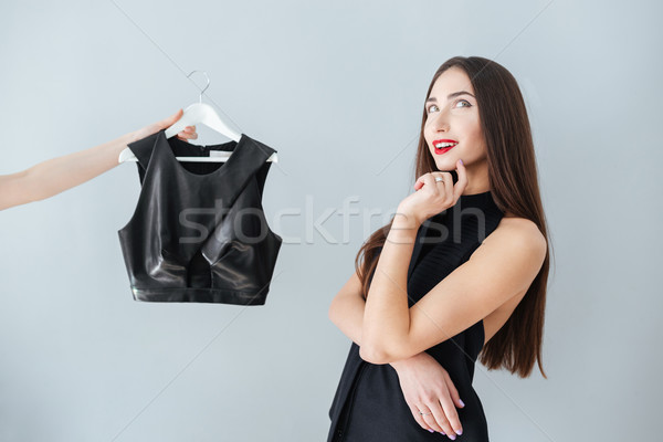 Vrouw denken kopen kleding gelukkig store Stockfoto © deandrobot