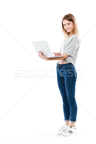Foto d'archivio: Shot · donna · utilizzando · il · computer · portatile · computer · giovani · isolato