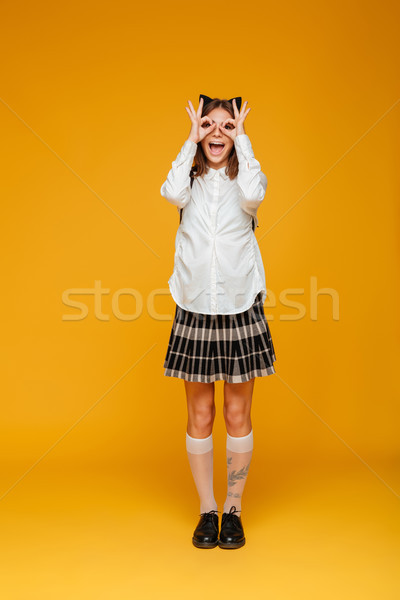 Portrait écolière uniforme sac à dos [[stock_photo]] © deandrobot