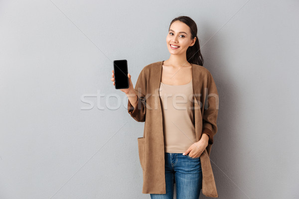 Portrait satisfait jeunes asian femme [[stock_photo]] © deandrobot