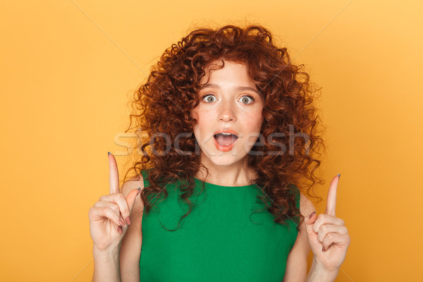 Közelkép portré derűs fürtös vörös hajú nő nő Stock fotó © deandrobot