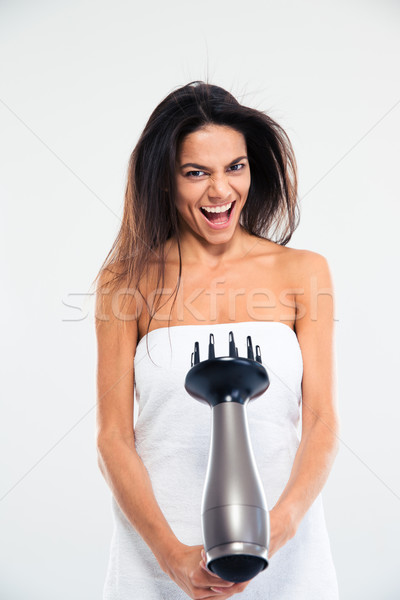 Laughing woman in towel drying her hair  Stock photo © deandrobot