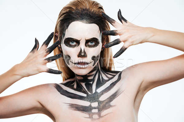 Closeup of woman with gothic terrifying makeup posing Stock photo © deandrobot