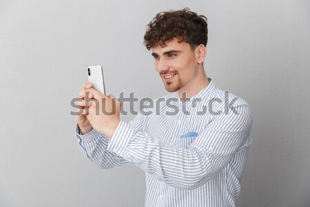 Foto stock: Retrato · joven · mirando · condón · blanco · signo