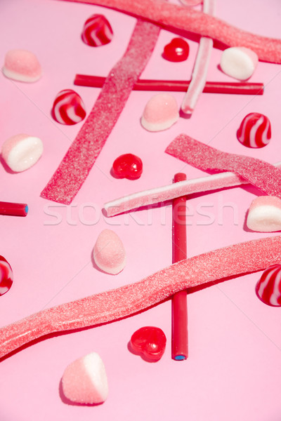Colorful mix of pink and red sugar candies and lollies Stock photo © deandrobot