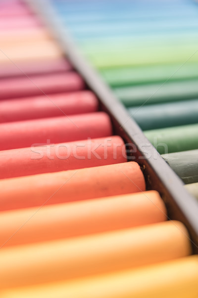 Close-up image of colorful chalk pastels in box Stock photo © deandrobot