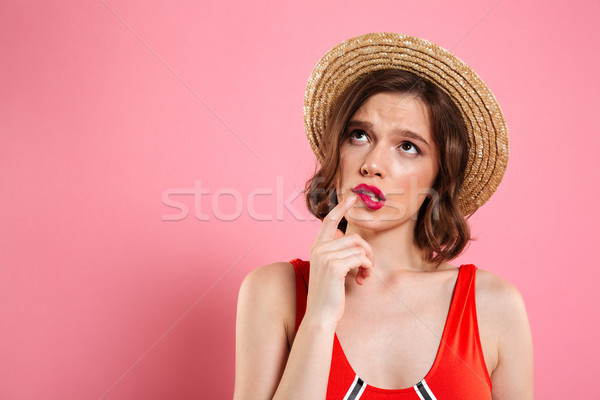 Close up portrait of a unsure doubtful girl Stock photo © deandrobot