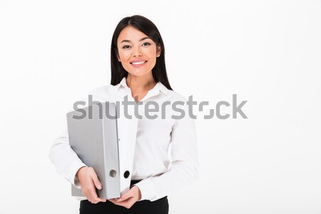 Portrait of a smiling asian businesswoman Stock photo © deandrobot