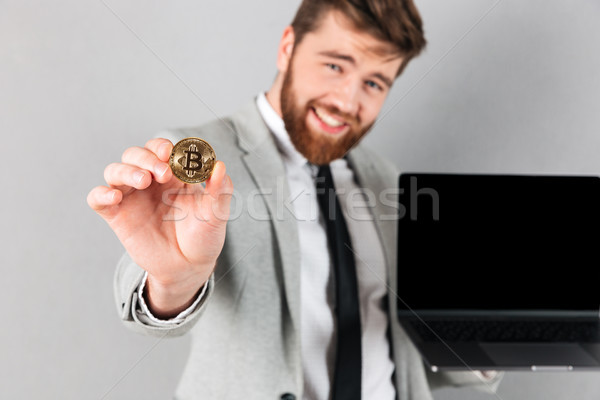 Stock photo: Close up portrait of a smiling businessman